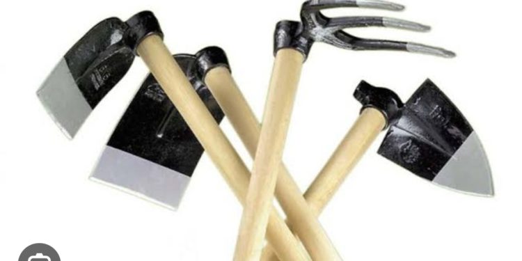 MP Luke Kyobe donates hoes to constituents in Luuka North