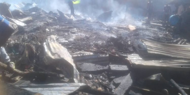 Locals and police use buckets to manage situation as fire eats up 8 houses in Jinja